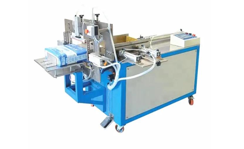 Sanitary napkin sealing machine