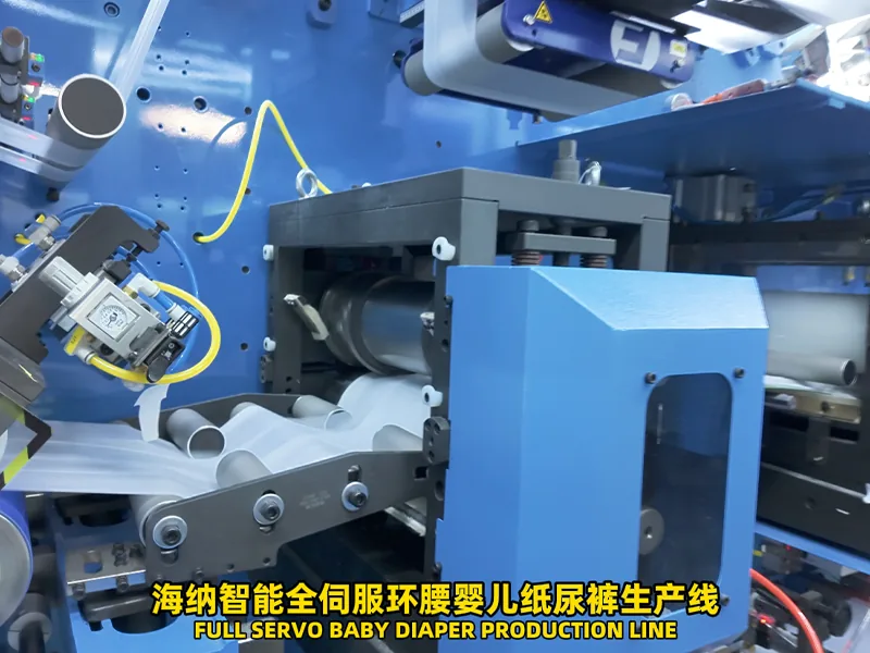 Baby diaper machine material unwinding and process modules