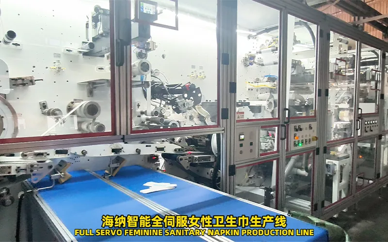 Sanitary napkin converting modules that influence machine configuration cost